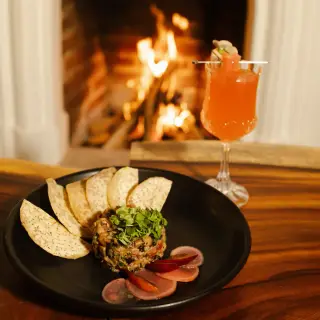 Mushroom tartare with crisps and radishes, by the fireplace