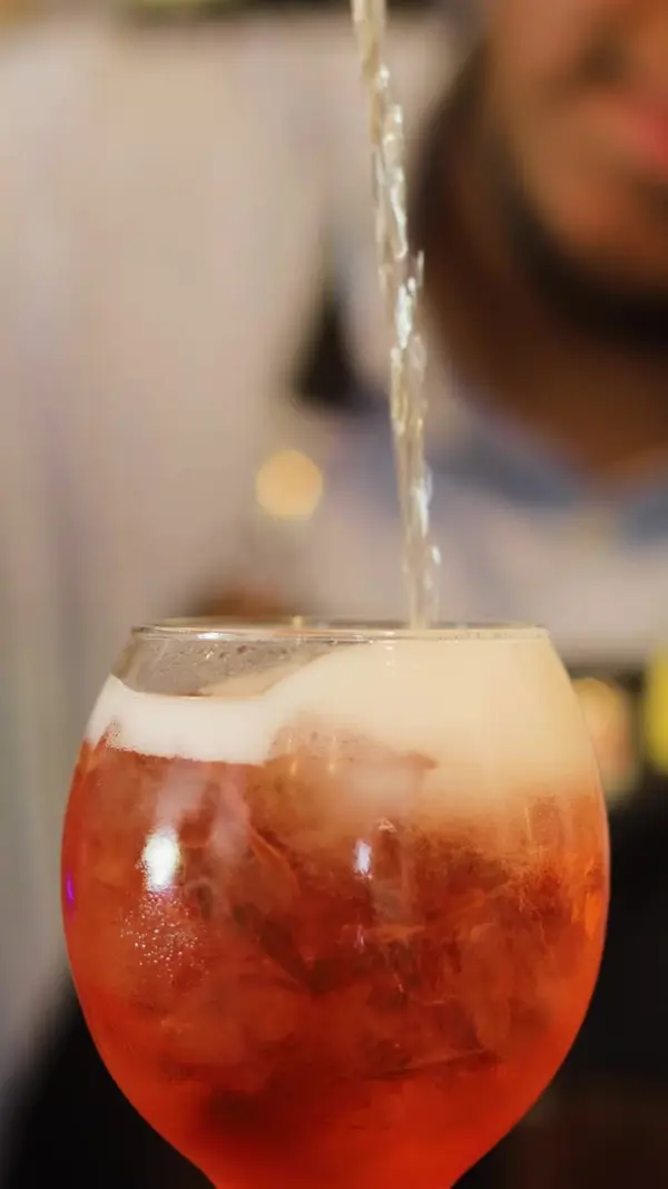 A freshly poured cocktail on ice at the Rosanta bar